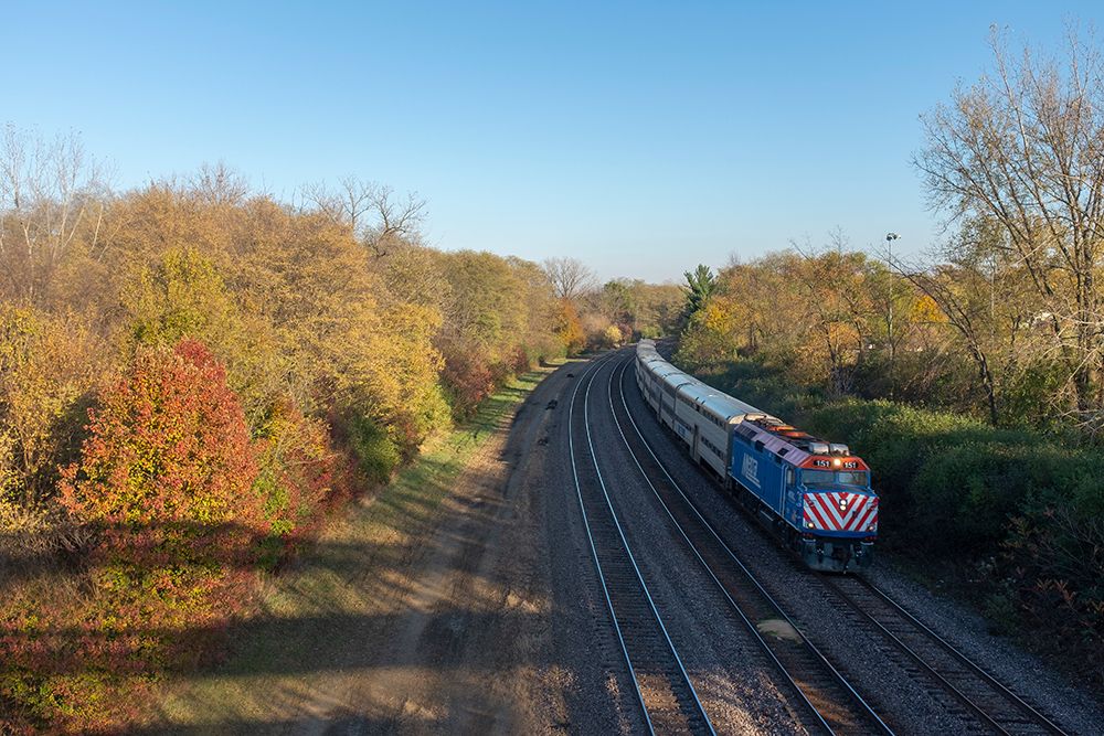 photo of metra train passing through Wheaton in Fall